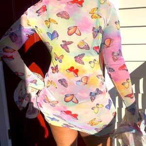 Mesh Butterfly dress with fancy sleeves.